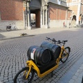 Heilige Geestcollege -- In foreground, work bike for delivering kegs of beer.  In background, a historic site of the #EuropeanPhysicalSociety, including the office of #GeorgesLemaître who first in 1927 developed the theory of the Big Bang, consistent with an expanding universe.  Wth the history of the University of Leuven dating back to 1425, and closures during period of French and Netherlander rule, the Catholic University from 1835 was French-speaking, until a split in 1970 changed the institution to a Flemish (Dutch) language institution.  (Heilige Geestcollege (Holy Chost College), Naamsestraat, Leuven, Belgium) 20211108