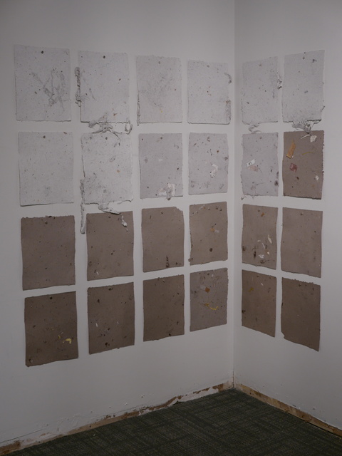 In corner of large main room, Aileen Bahmanipour (2024) Manuals for Waste is a sorted series of 24 handmade papers. Sheets are made of domestic waste discards and scraps of receipts, shaded with hair and dust from a HVAC vacuum cleaner. Venue has an industrial feeling, that reminds us of galleries in Pittsburgh. (Industrial Arts, Steelcase Art Projects, Steelcase Road East, Markham, Ontaro) 20241207 P1070661.JPG